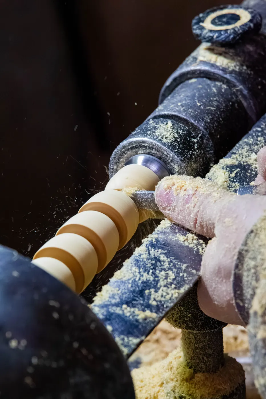 Wood being turned on a lathe